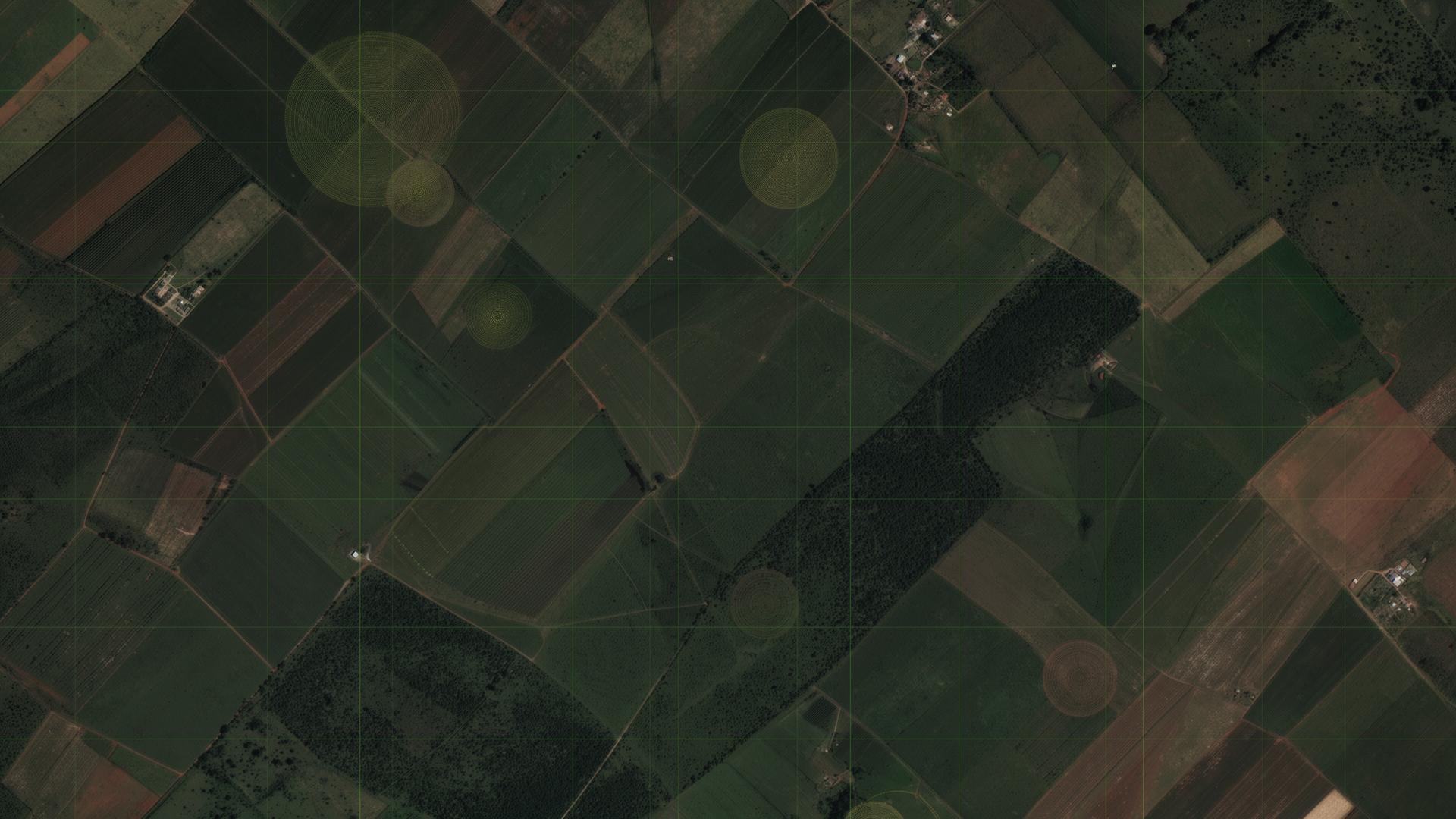 Vista aérea de propriedade rural com sobreposição de grade GIS